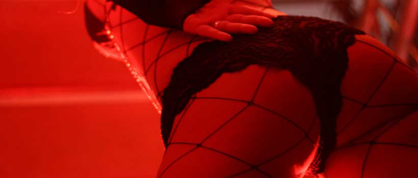 Eine Prostituierte bei Ihrer Arbeit im Rotlichtmilieu